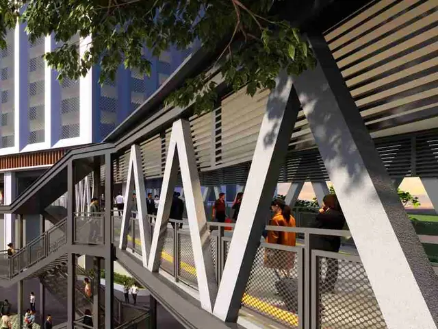 Covered pedestrian sky bridge beside the retail podium near RTS Bukit Chagar
