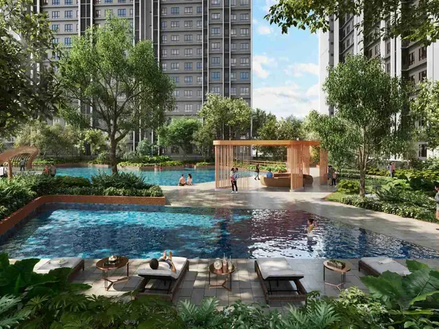 Resort-style swimming pool with sun loungers and a garden pavilion near RTS Bukit Chagar