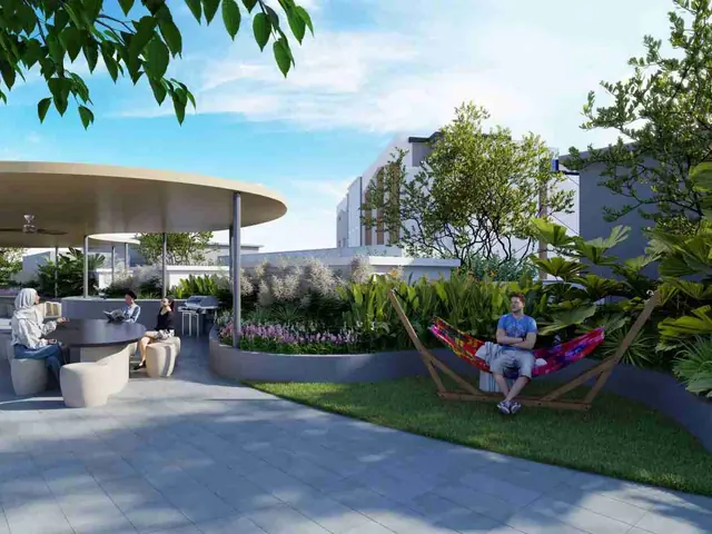 Rooftop BBQ and dining pavilion with a hammock lawn